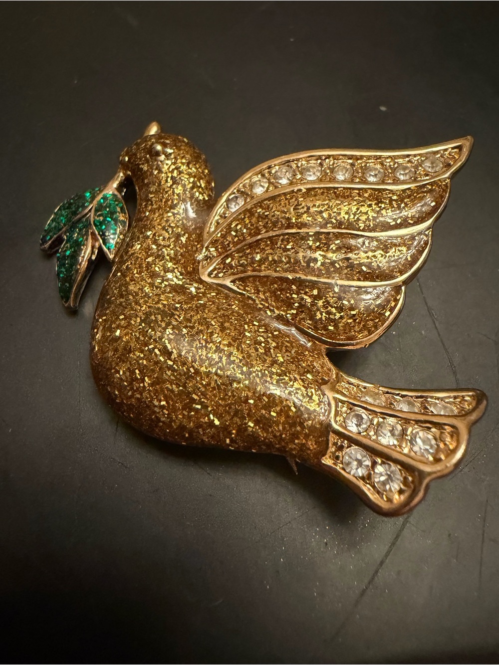 Gold-tone Dove Brooch with Emerald Leaf Accent